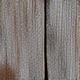 Close-up of weathered reclaimed barnwood texture.